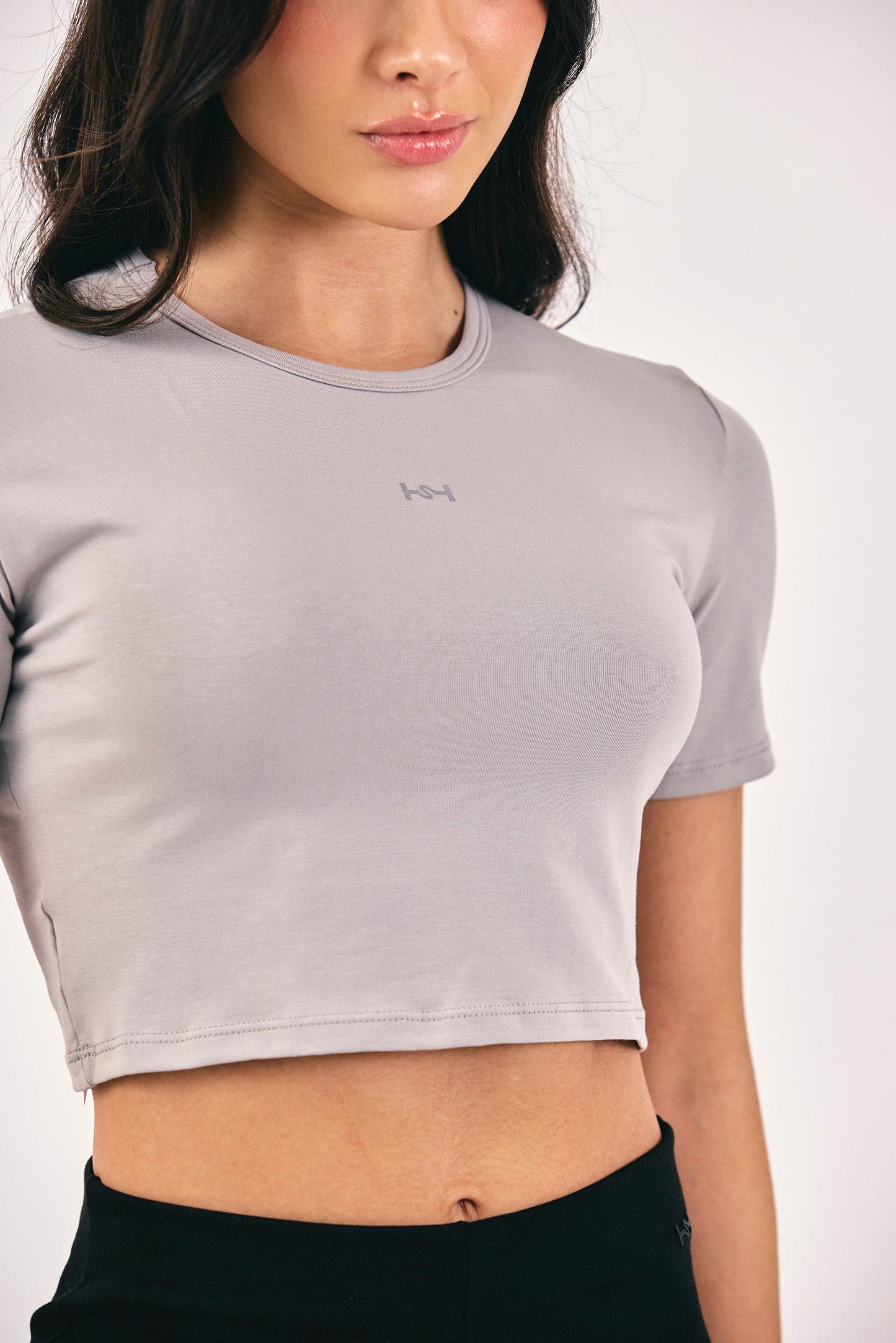 ESSENTIAL CROP GRIS